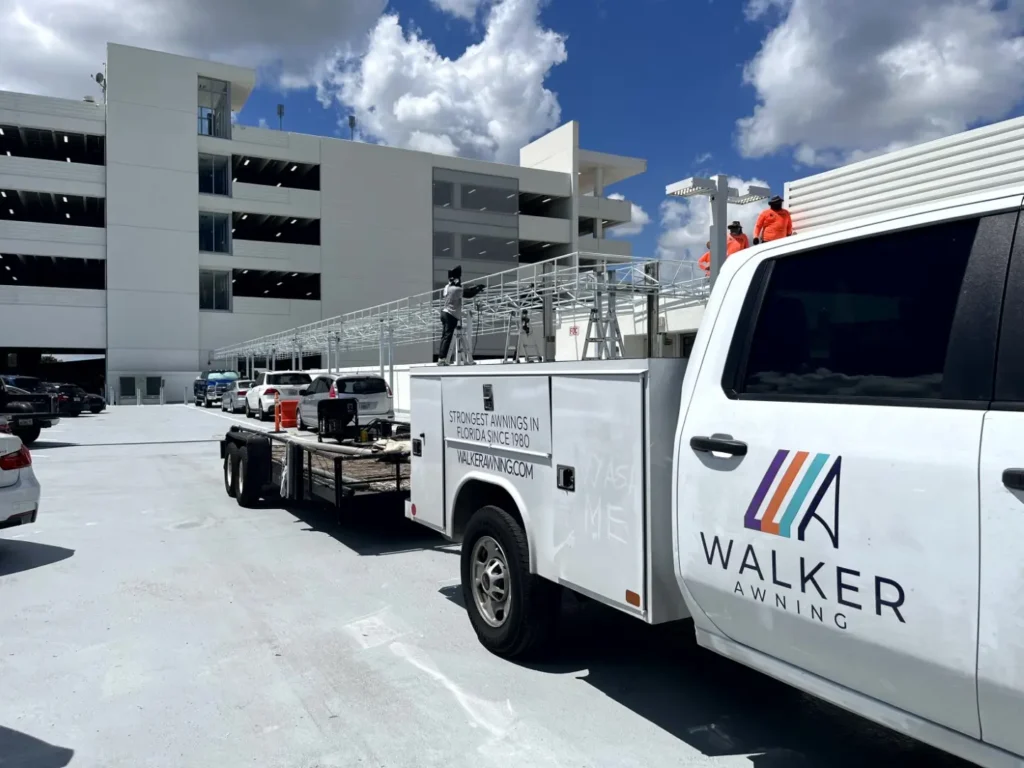 Walker Awning crew working on a custom frame